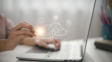 Businesswoman hand working with a Cloud Computing diagram on the new computer interface as concept photo