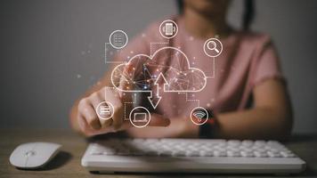 Businesswoman hand working with a Cloud Computing diagram on the new computer interface as concept photo