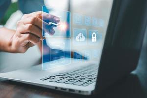 Concept of online document management technology. Businesspeople manage corporate databases through cloud, cyberspace technology and large, paperless archives of important, file and online storage. photo
