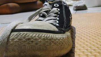 close up used sneaker casual shoe photography photo