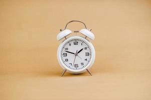 white alarm clock stop watch photo