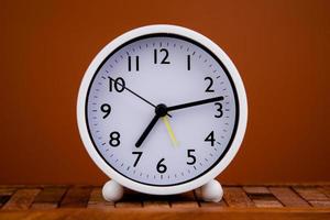 white alarm clock stop watch photo