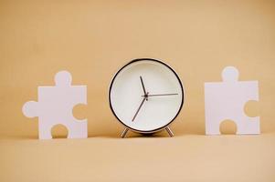 clock and jigsaw time and puzzle pieces photo