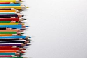 Color pencils set, row wooden color pencils isolated on white background. colored pencils for drawing. copy space photo