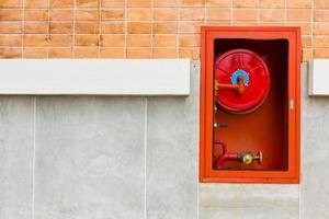 Fire extinguishers on wall photo