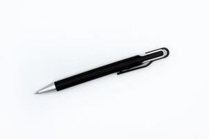 Flat lay of black modern pen or mechanical pencil isolated on white background. Top view of object for writing photo