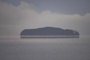 Island Appearing out of the Morning Fog photo