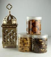 Indonesian famous cake for celebrate Ied Mubarak, famous cookies in a jar with a pink clear background. selective focus