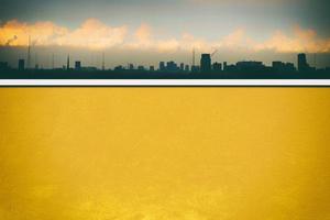 Fortuna Gold Grunge Wall with City Scape and Dark Blue Sky Background. photo
