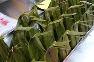 Curried Fish Wrapped in Banana Leaves and Steamed. Homok in Thai. It is a Famous Thai Food Recipe. photo