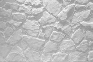 White Stone Wall Texture with Light Beam from the Top for Background, Suitable for Backdrop and Mockup. photo