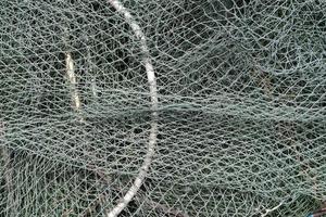 Old Net Fish Trap Texture Background. photo