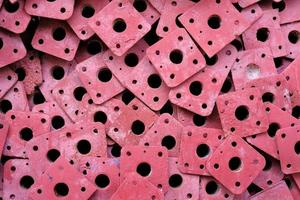 Pile of Old Metal Red Pole Background. photo