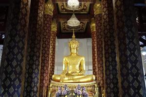 Ancient Golden Buddha Image at Wat Na Phra Meru Rahikaram Temple where is a Famous Temple in Ayutthaya, Thailand.