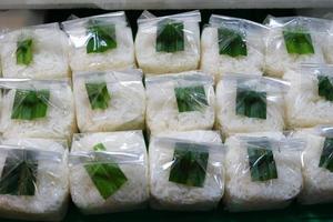 Sweetmeat Consisting of Fermented Glutinous Rice in Kaomark in Thai. It is a Famous Thai Food Recipe. photo