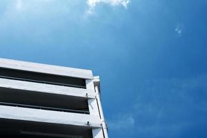 Car Parking Building with Blue Sky in Minal Style. photo