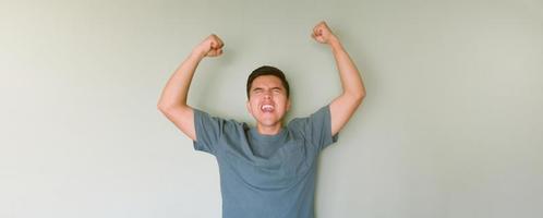 Super happy man celebrating a victory photo