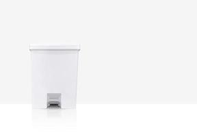 White trash can with lid on white background There is space for text. photo