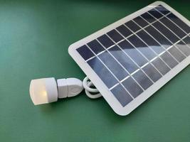 Solar battery to charge smartphone and power bank photo