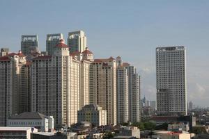 evening atmosphere in the city of Jakarta with tall buildings photo