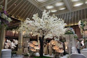 indoor artificial tree as wedding event decoration photo