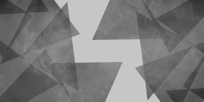 Triangle black and gray abstract background. Geometric shapes lines angles shapes in white and gray layers of material. photo