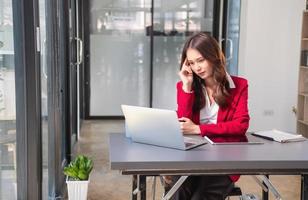 Concept Burnout Syndrome. Business Woman feels uncomfortable working. Which is caused by stress, accumulated from unsuccessful work And less resting body. Consult a specialist psychiatrist. photo