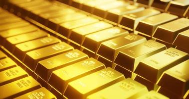 Row of gold bars close up view. photo
