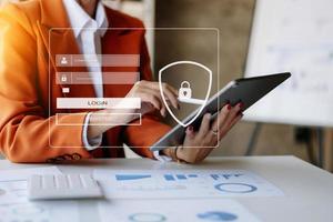 Cyber security concept, Login, User, identification information security and encryption, secure access to user's personal information woman using smart phone and tablet photo