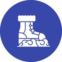 icono de vector de botas de nieve