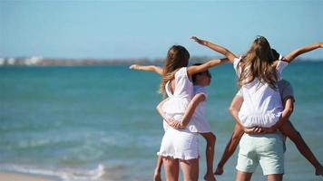 Photo of happy family having fun on the beach. Summer Lifestyle video