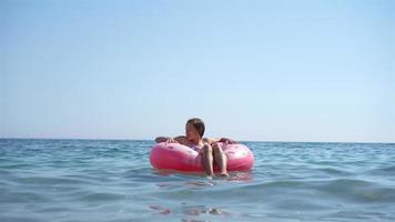 Cute little girl at beach during summer vacation video