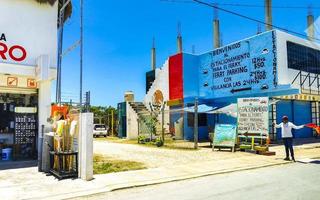 Chiquila Quintana Roo Mexico 2022 Small village port ferry road houses people cars Chiquila Mexico. photo