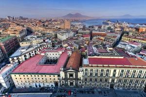 Naples, Italy - Aug 17, 2021, Aerial view of Naples, Italy, Mount Vesuvius and its harbor on the Mediterranean Sea. photo