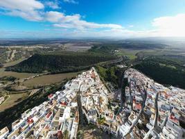 Andalusian town of Vejer de la Frontera with beautiful countryside on on a sunny day, Cadiz province, Andalusia. photo