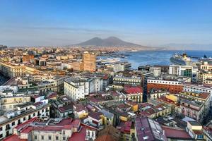 Naples, Italy - Aug 17, 2021, Aerial view of Naples, Italy, Mount Vesuvius and its harbor on the Mediterranean Sea. photo