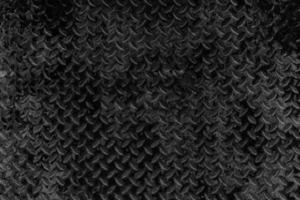 Black Grunge Diamond Metal Plate Background. photo