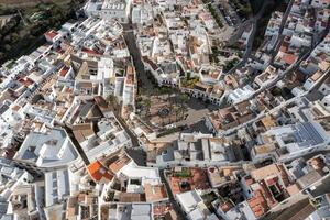 Andalusian town of Vejer de la Frontera with beautiful countryside on on a sunny day, Cadiz province, Andalusia. photo