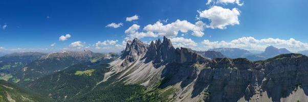 Morning view of the Gardena valley in Dolomite mountains. Location Puez-Geisler National Park, Seceda peak, Italy, Europe. Odle group is the landmark of Val di Funes. photo