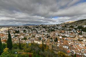 Panorama of El Albayzin district in Granada, Andalusia, Spain, pictured from the Torre del Cubo in the Alacazaba Fortress. photo