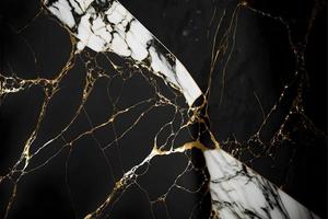 Elegant black, white, and gold marble background texture for use in design projects photo
