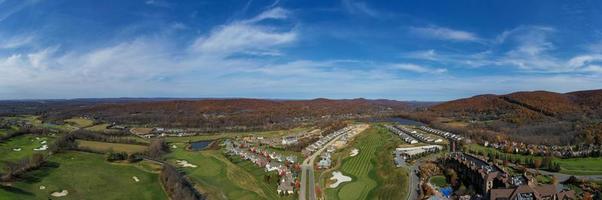 Aerial view of houses in Hamburg, New Jersey during peak foilage in autumn time. photo