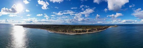 Aerial view of the Montauk Lighthouse and beach in Long Island, New York, USA. photo