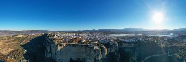 Bullring of the Royal Cavalry of Ronda aerial view at sunrise in Spain. photo