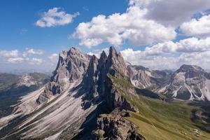 Morning view of the Gardena valley in Dolomite mountains. Location Puez-Geisler National Park, Seceda peak, Italy, Europe. Odle group is the landmark of Val di Funes. photo