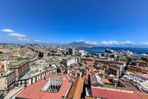 Naples, Italy - Aug 17, 2021, Aerial view of Naples, Italy, Mount Vesuvius and its harbor on the Mediterranean Sea. photo