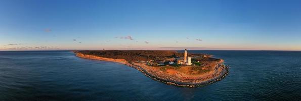 Montauk Lighthouse and beach at sunrise, Long Island, New York, USA. photo