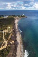 Aerial view of the Montauk Lighthouse and beach in Long Island, New York, USA. photo