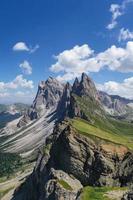 Morning view of the Gardena valley in Dolomite mountains. Location Puez-Geisler National Park, Seceda peak, Italy, Europe. Odle group is the landmark of Val di Funes. photo