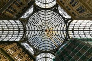 Naples, Italy - August 17, 2021, Interior view of Galleria Umberto I, a public shopping gallery in Naples, Italy. Built between 1887-1890 photo